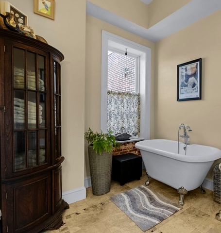 Bathroom with claw-foot soaking tub